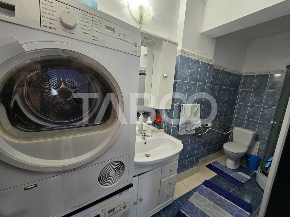 Apartament decomandat 3 camere 2 bai 66 mp parcare boxa Terezian Sibiu