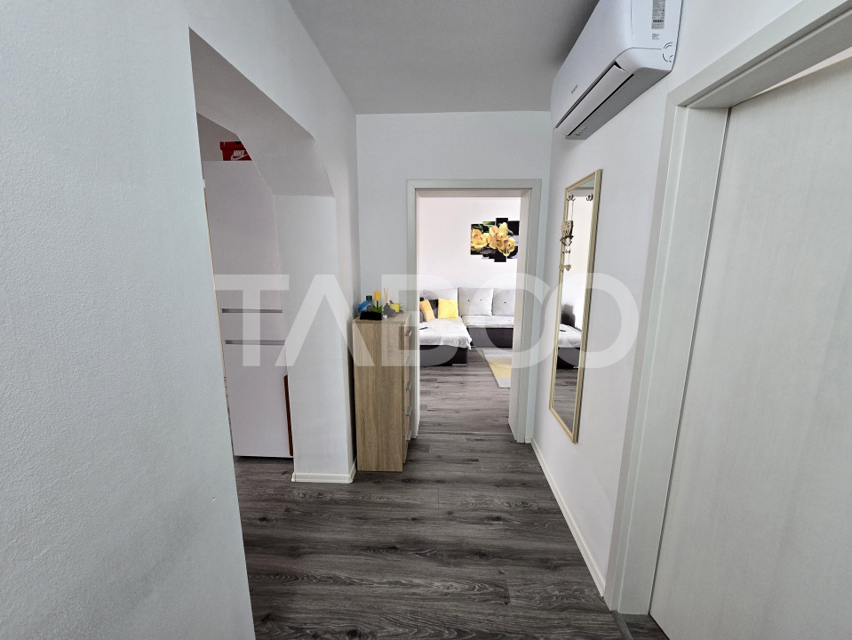 Apartament decomandat 3 camere 2 bai balcon pivnita Strand Sibiu