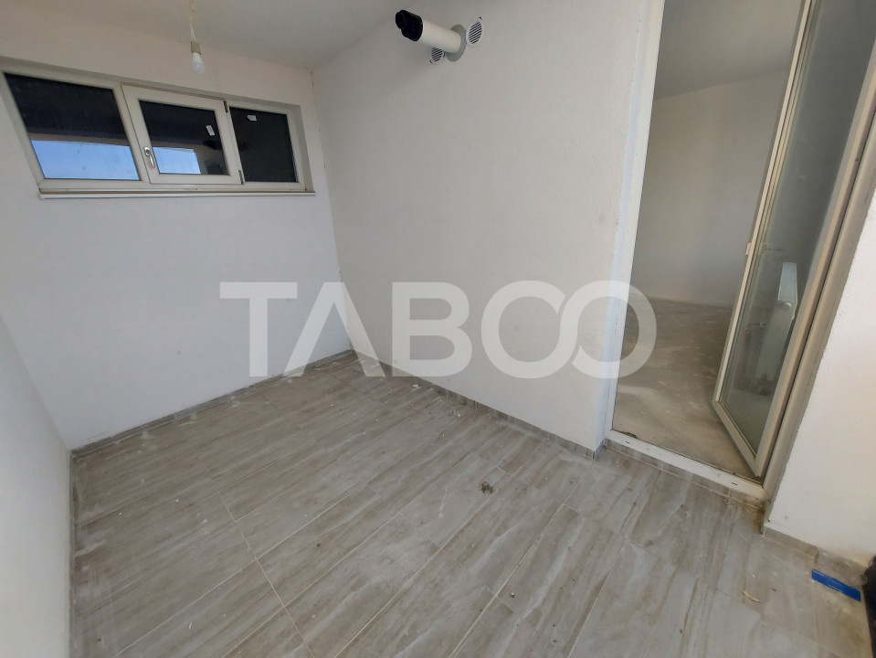 Apartament decomandat 52mpu de vanzare 2 camere 2 logii loc parcare