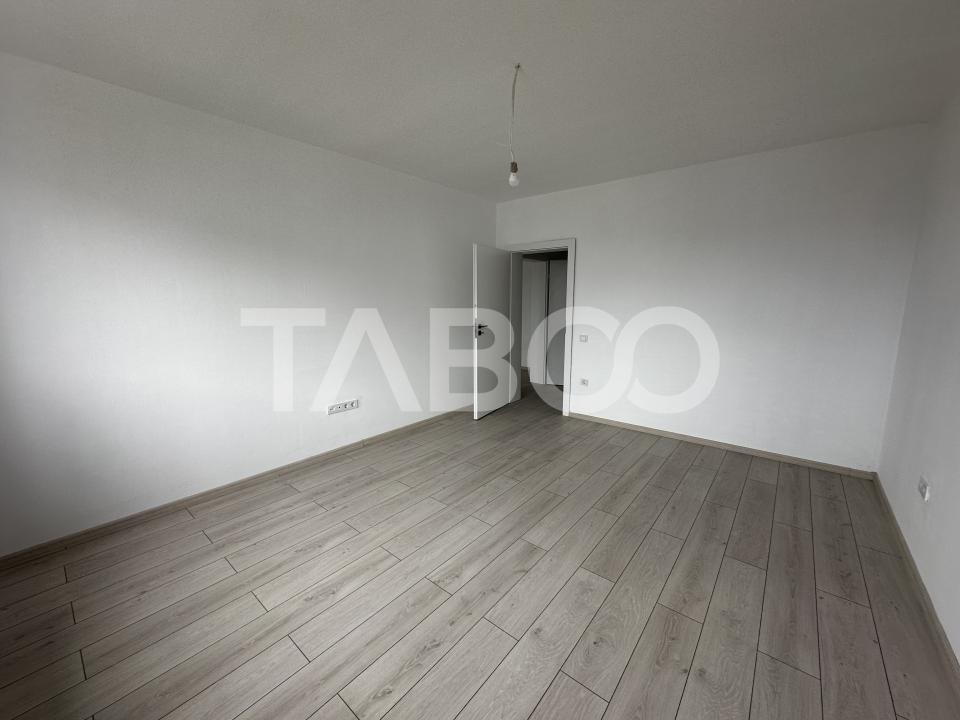 Apartament decomandat de vanzare 52 mpu 2 camere 2 logii loc parcare