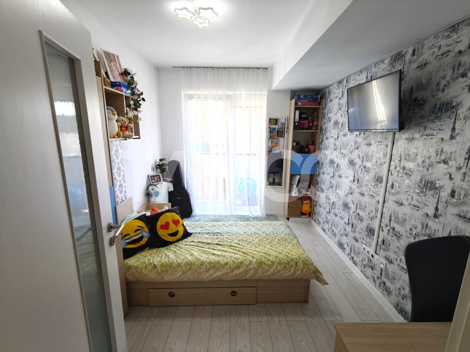 Apartament decomantat 3 camere 2 bai 70 mp utili cu parcare subterana