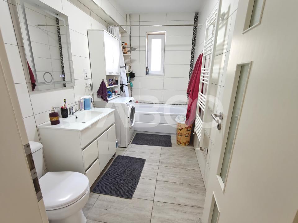 Apartament decomantat 3 camere 2 bai 70 mp utili cu parcare subterana