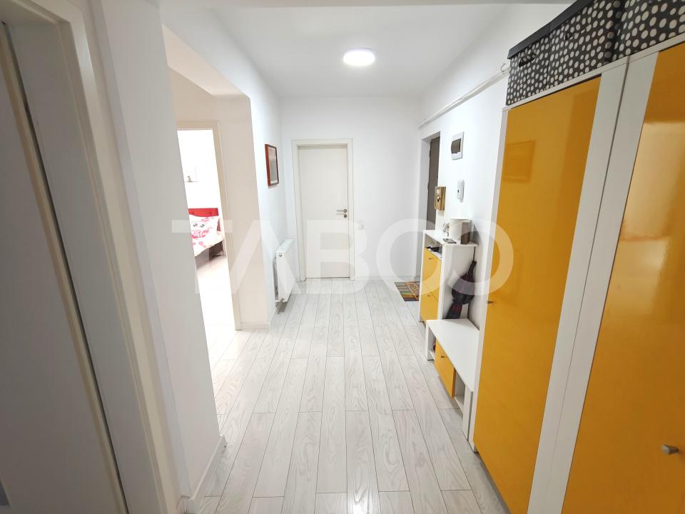 Apartament decomantat 3 camere 2 bai 70 mp utili cu parcare subterana