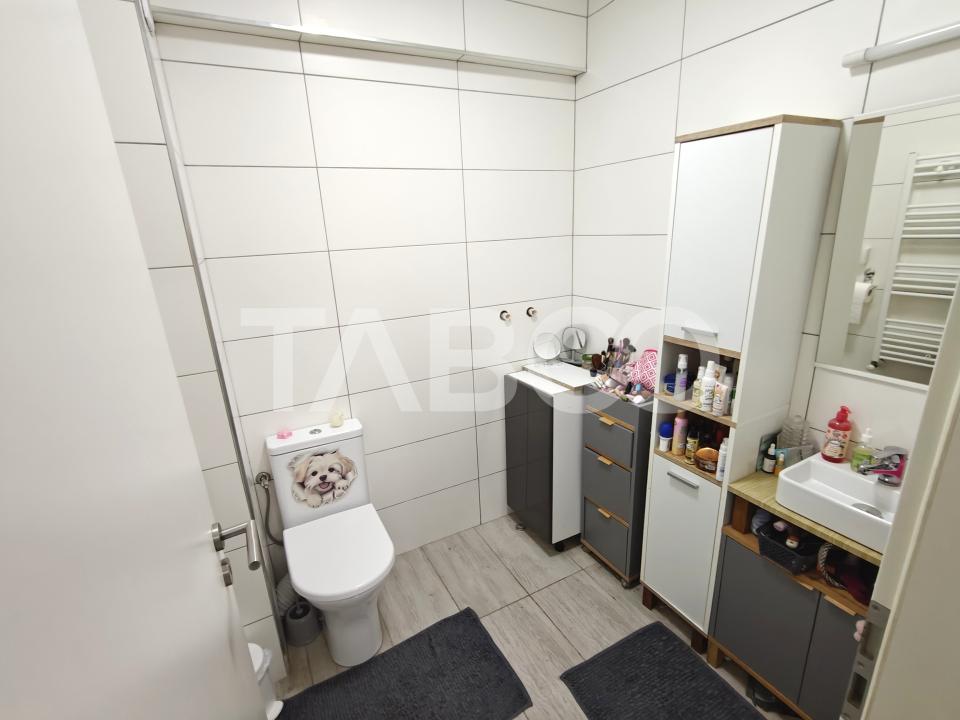 Apartament decomantat 3 camere 2 bai 70 mp utili cu parcare subterana