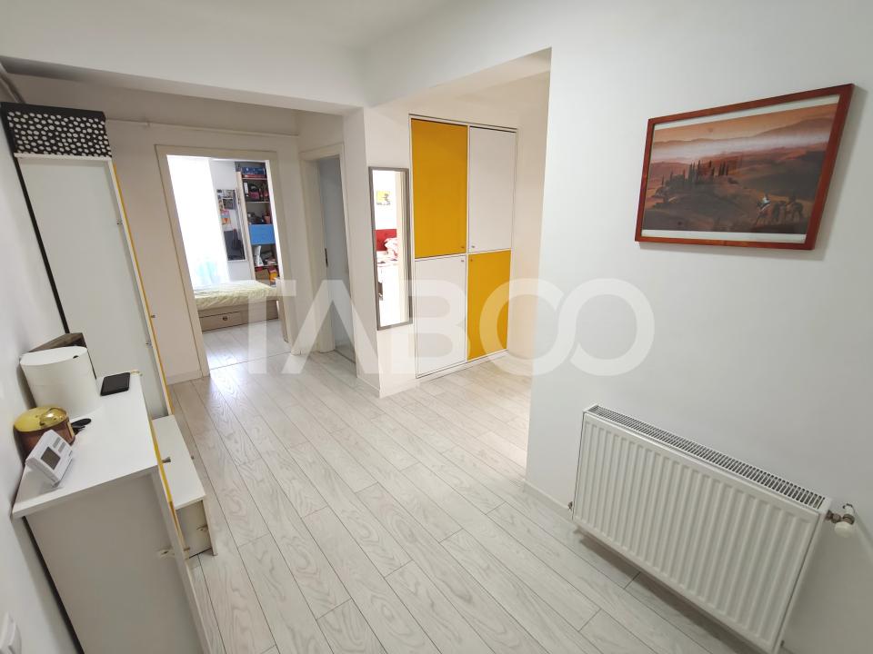 Apartament decomantat 3 camere 2 bai 70 mp utili cu parcare subterana