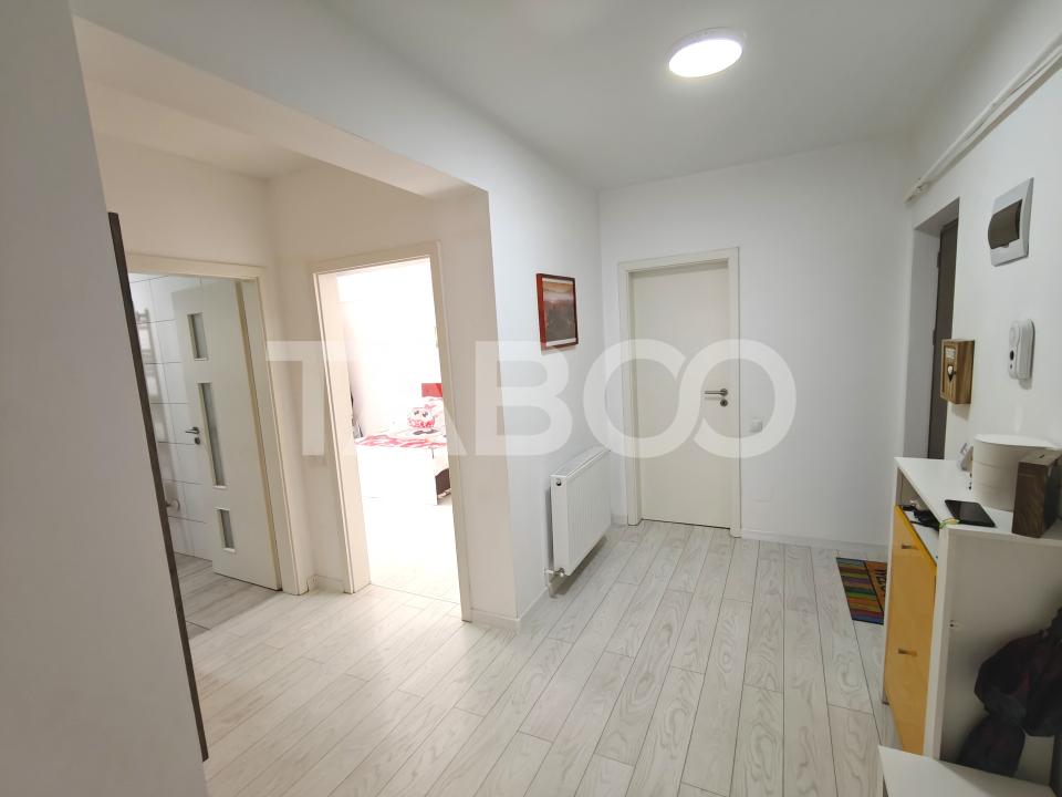 Apartament decomantat 3 camere 2 bai 70 mp utili cu parcare subterana