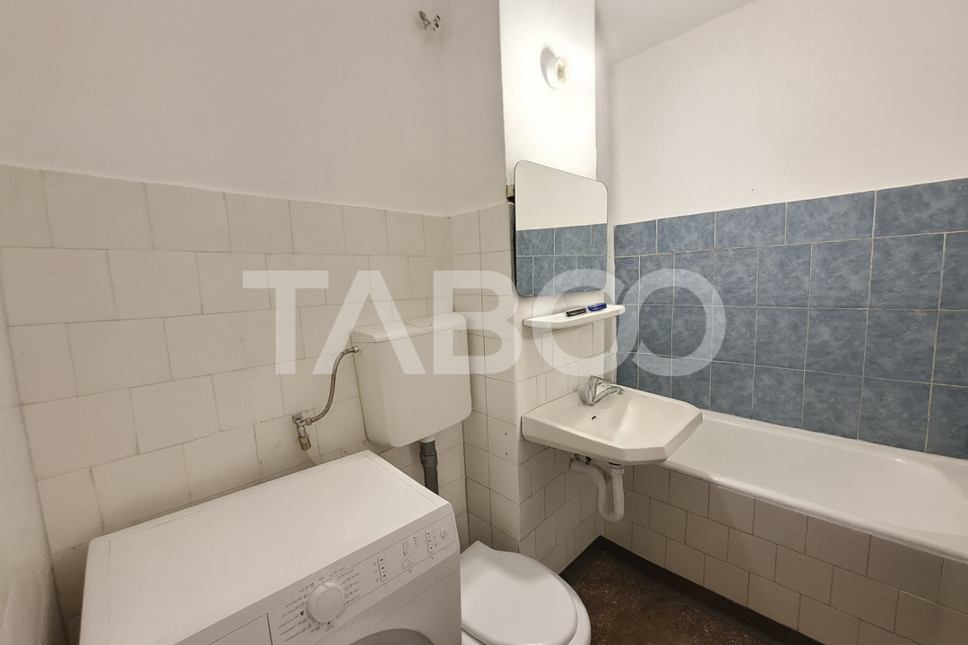 Apartament etaj 1 de vanzare 3 camere 2 bai balcon pivnita Cisnadie