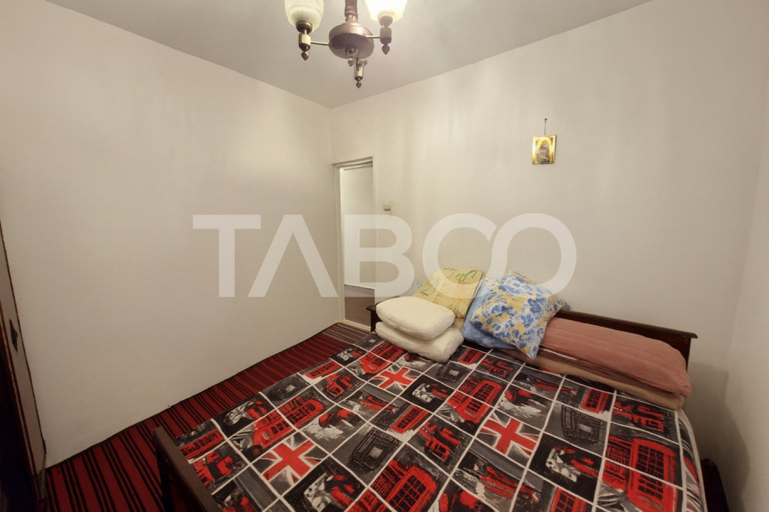 Apartament etaj 1 de vanzare 3 camere 2 bai balcon pivnita Cisnadie