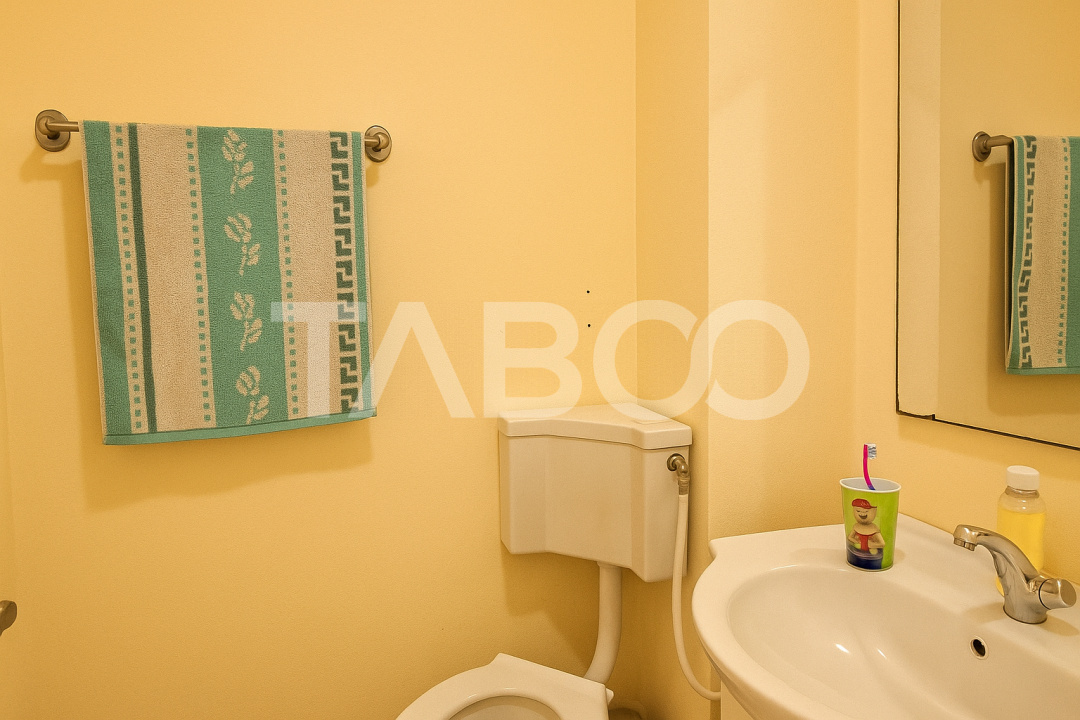 Apartament etaj 1 de vanzare 3 camere 2 bai balcon pivnita Cisnadie