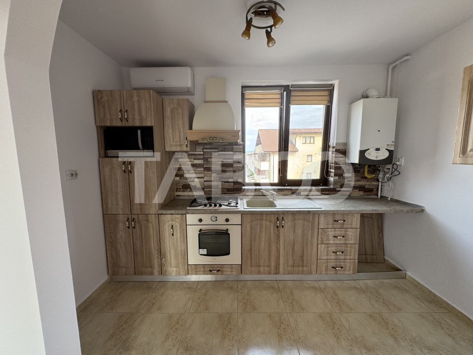 Apartament etaj 2 decomandat 3 camere balcon 69 mpu Selimbar Sibiu