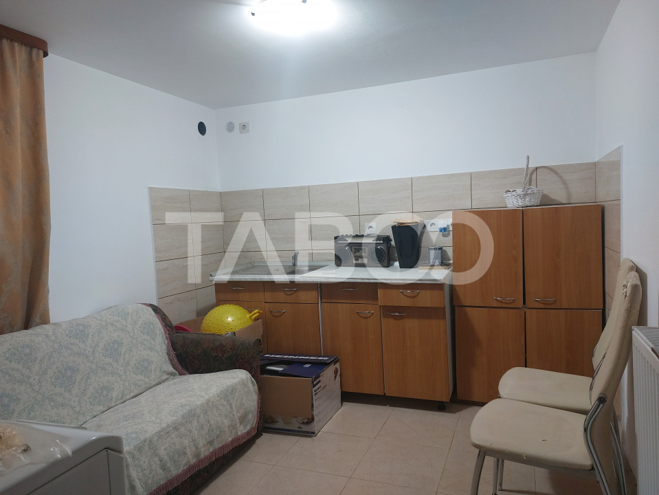 Apartament la casa 97 mpu 5 camere 2 bucatarii 3 bai gradina Cisnadie