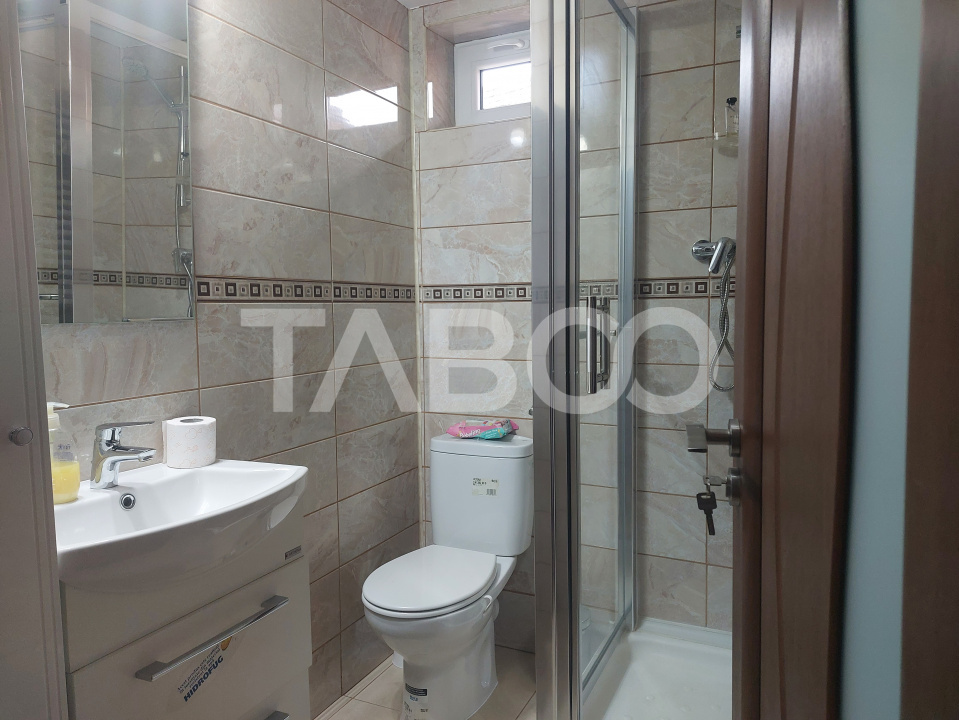 Apartament la casa 97 mpu 5 camere 2 bucatarii 3 bai gradina Cisnadie