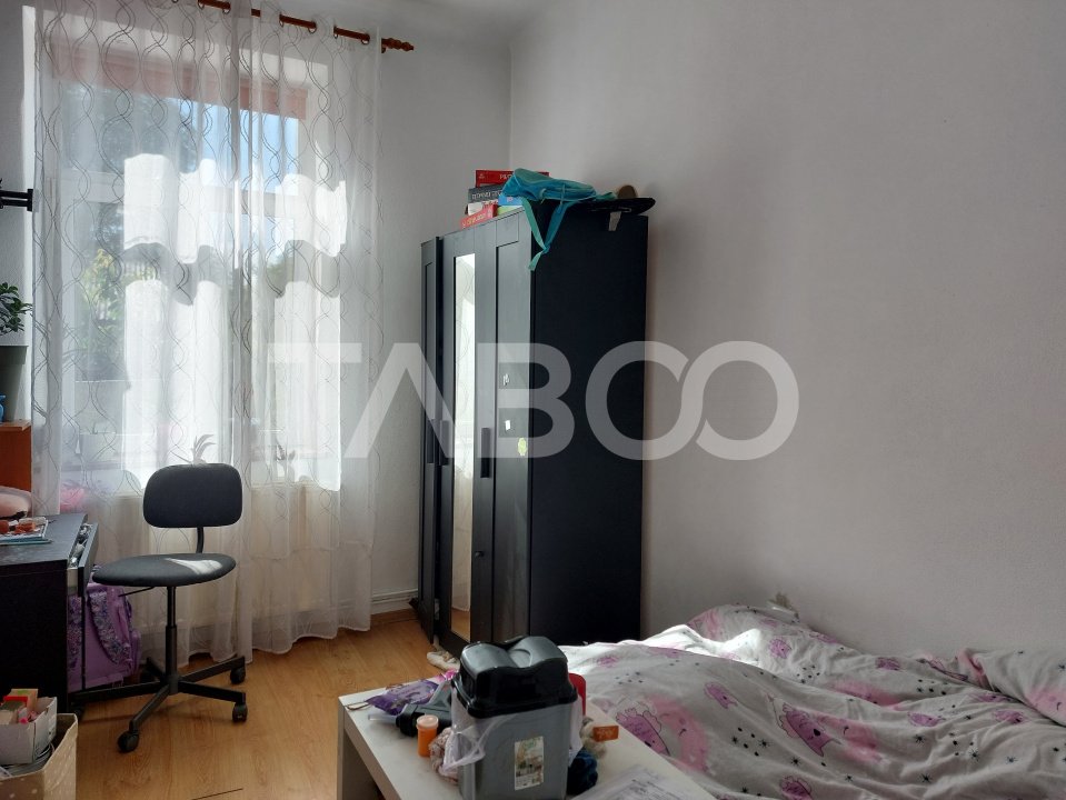 Apartament la curte 3 camere 59 mp pivnita gradina 60 mp Cisnadie