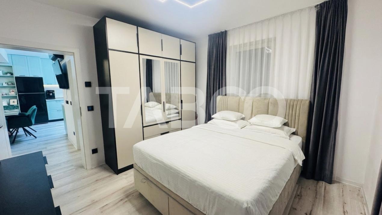 Apartament modern 3 camere de vanzare mobilat utilat 2 locuri parcare