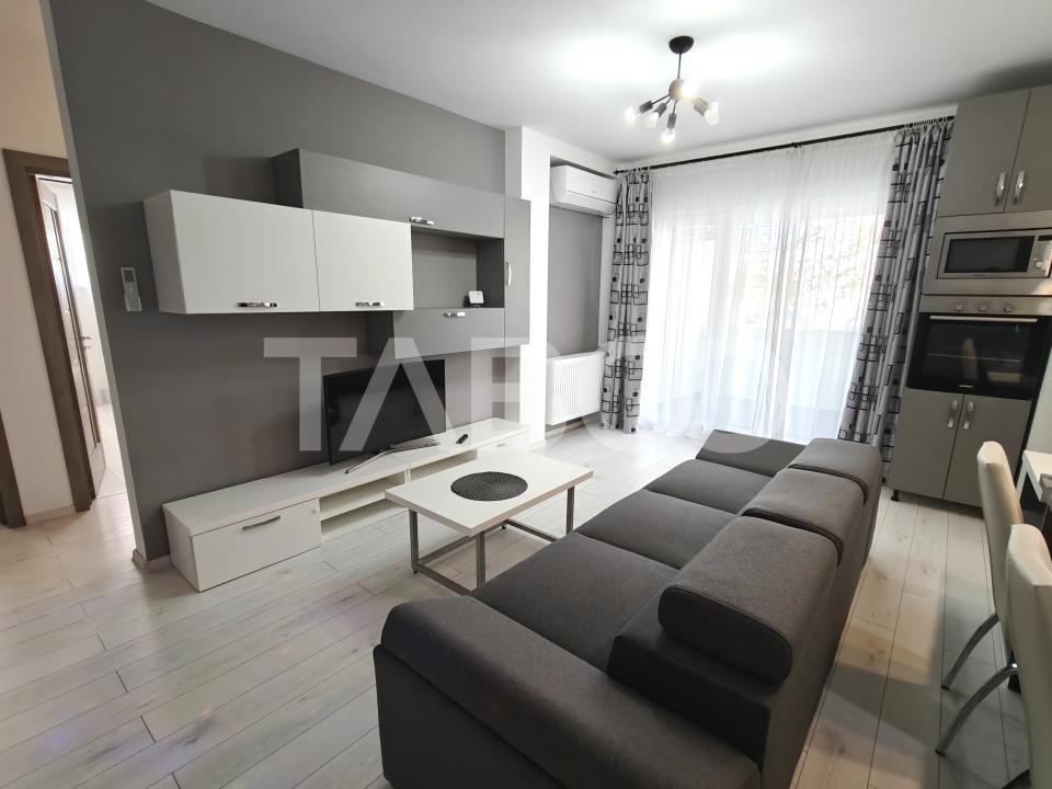 Apartament modern 3 camere - mobilat si utilat - balcon si parcare