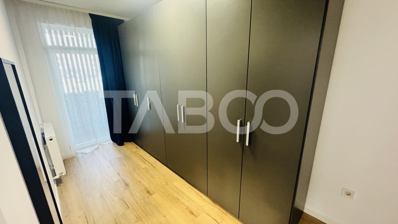 Apartament modern 63mpu 3 camere 2 bai 2 parcari de vanzare Sibiu