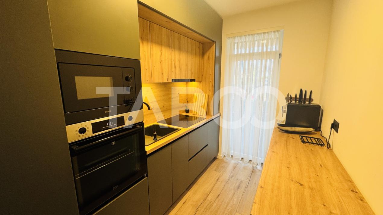 Apartament modern 63mpu 3 camere 2 bai 2 parcari de vanzare Sibiu