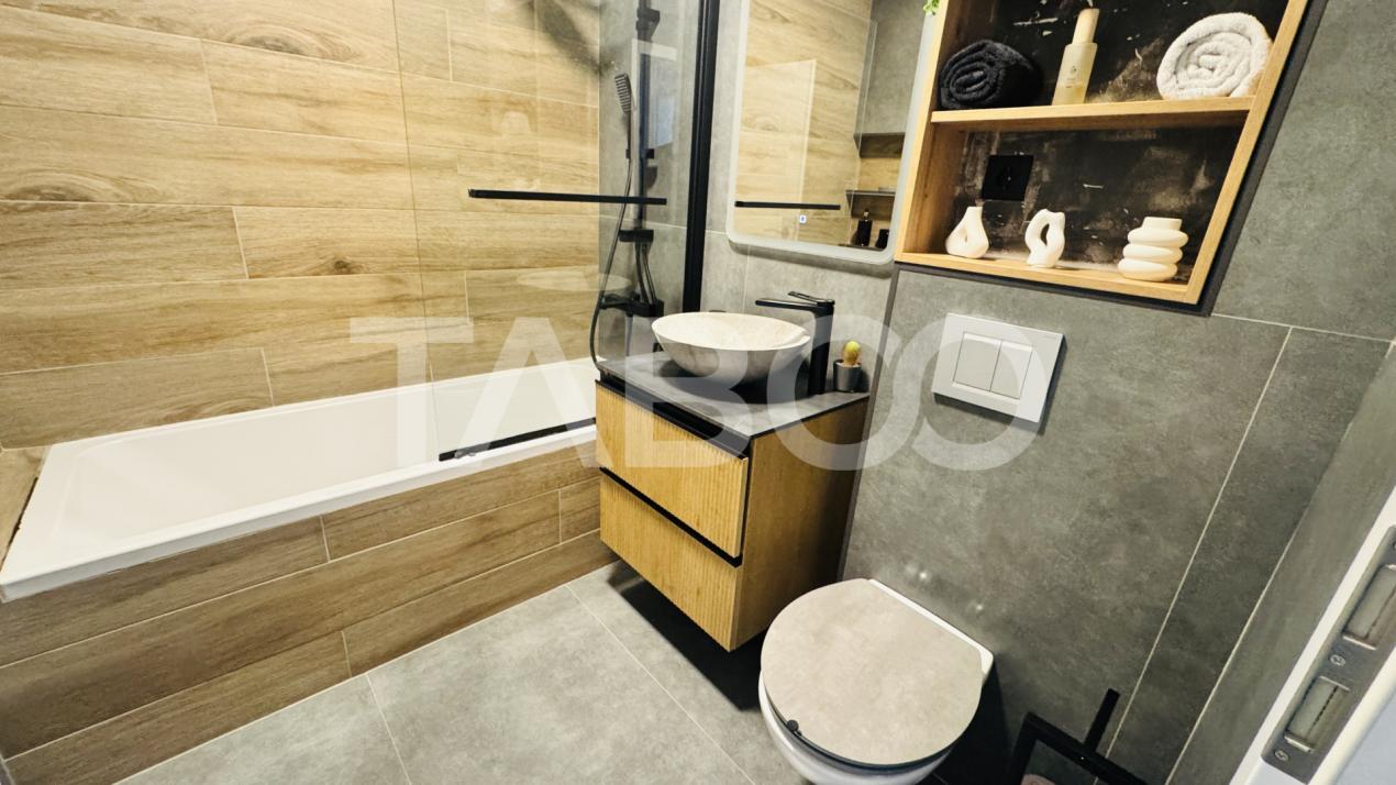 Apartament modern 63mpu 3 camere 2 bai 2 parcari de vanzare Sibiu