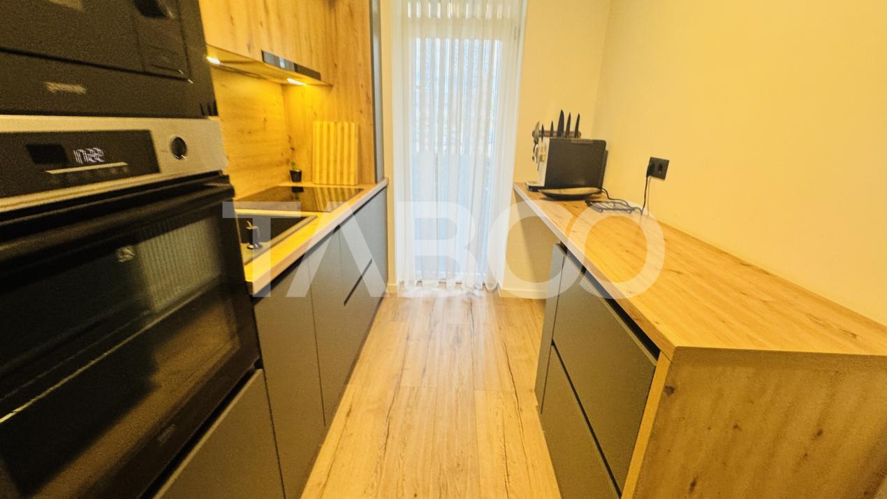 Apartament modern 63mpu 3 camere 2 bai 2 parcari de vanzare Sibiu