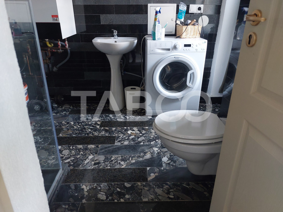 Apartament renovat 105mp 3 camere curte proprie 340mp in acte Cisnadie