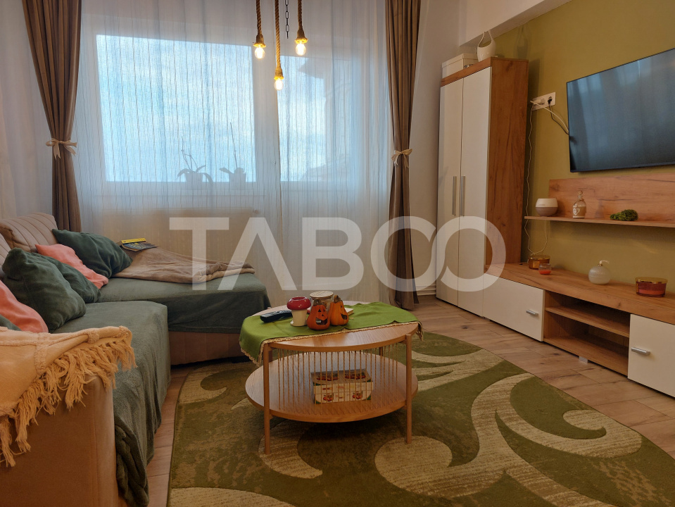 Apartament renovat 66 mp 3 camere 2 bai balcon pivnita Cisnadie