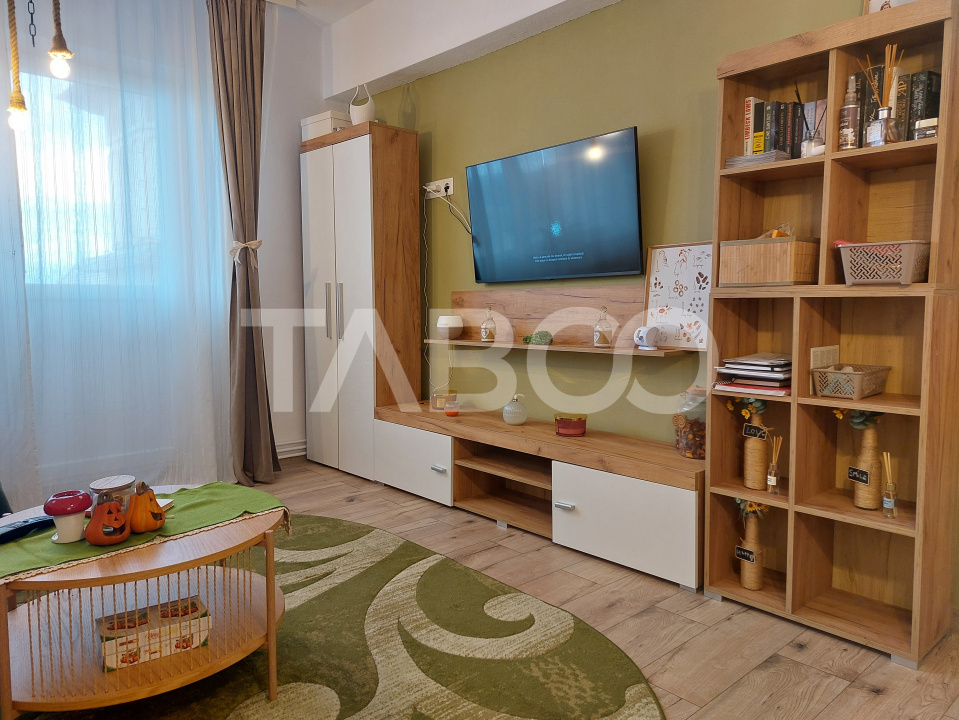 Apartament renovat 66 mp 3 camere 2 bai balcon pivnita Cisnadie