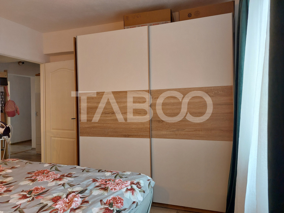 Apartament renovat 66 mp 3 camere 2 bai balcon pivnita Cisnadie