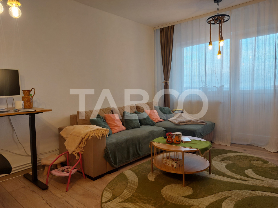 Apartament renovat 66 mp 3 camere 2 bai balcon pivnita Cisnadie