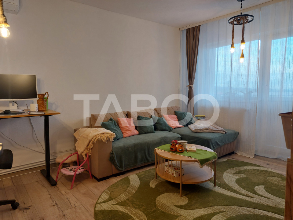 Apartament renovat 66 mp 3 camere 2 bai balcon pivnita Cisnadie