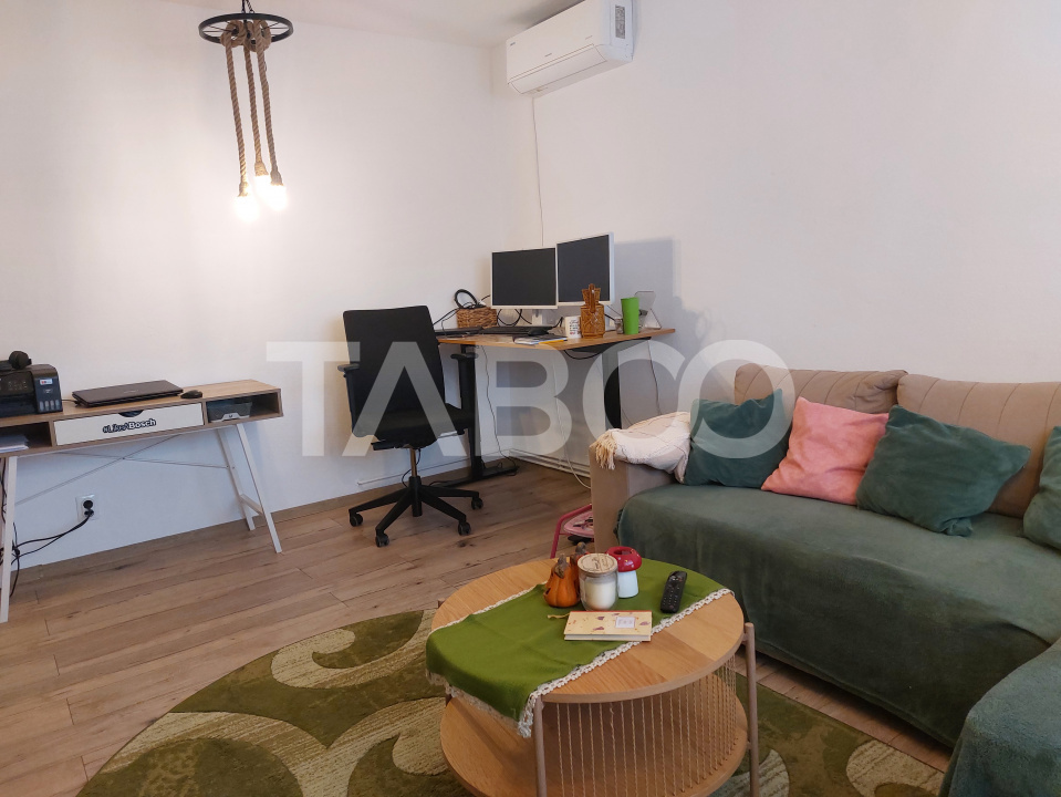 Apartament renovat 66 mp 3 camere 2 bai balcon pivnita Cisnadie