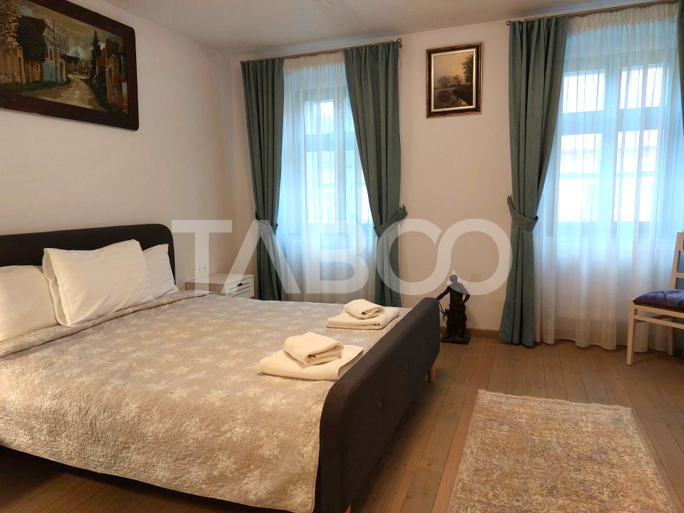 Apartament si Garsoniera la casa  4 camere 118 mpu central Cisnadie
