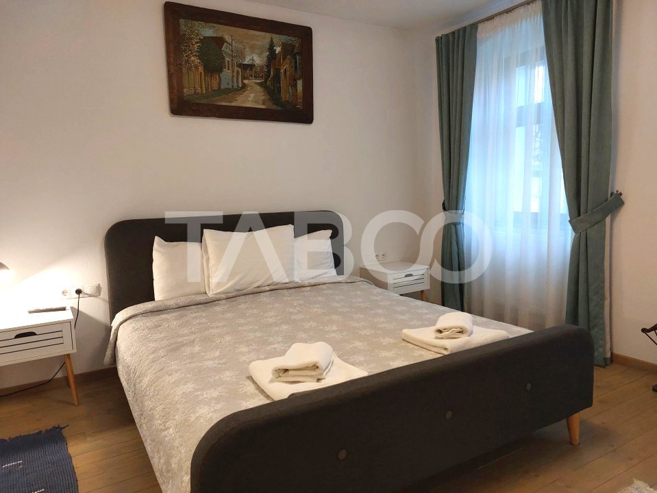 Apartament si Garsoniera la casa  4 camere 118 mpu central Cisnadie