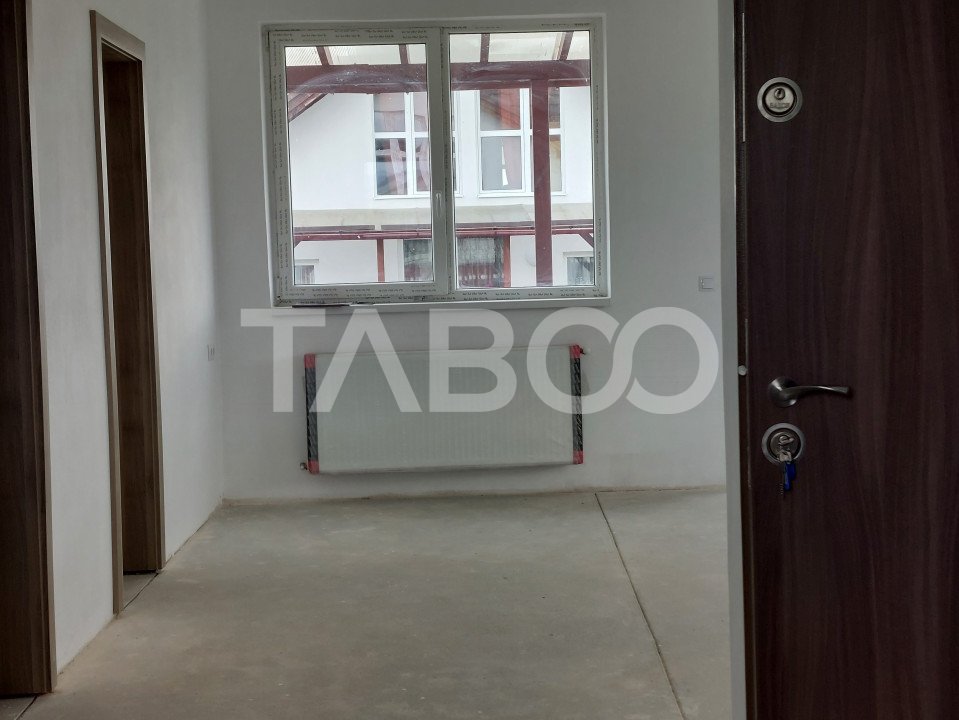 Apartament spatios bloc nou 3 camere  96 mp zona linistita in Cisnadie