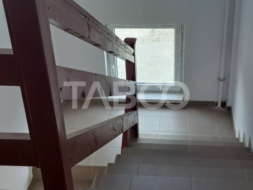 Apartament spatios bloc nou 3 camere  96 mp zona linistita in Cisnadie