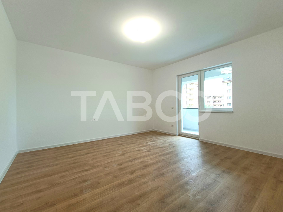 Apartament spatios cu 2 camere si bucatarie inchisa 57 mp utili