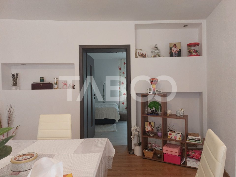 Apartament spatios la casa 3 camere decomandate 80 mp Cisnadie