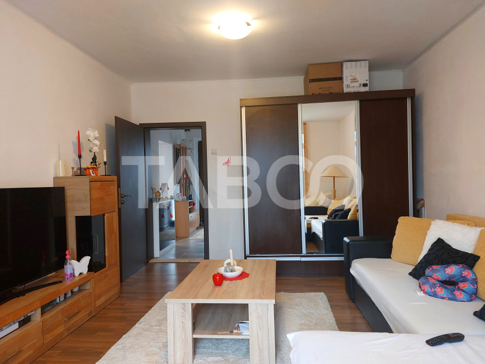 Apartament spatios la casa 3 camere decomandate 80 mp Cisnadie
