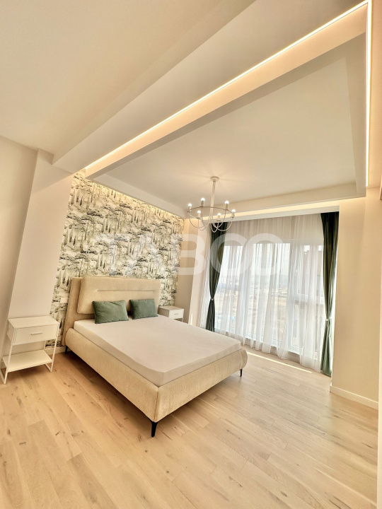 Apartament ultrafinisat tip penthouse de vanzare cu 3 camere Floresti
