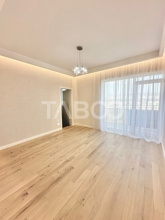 Apartament ultrafinisat tip penthouse de vanzare cu 3 camere Floresti