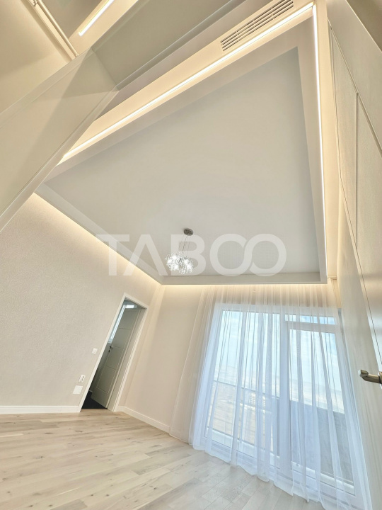 Apartament ultrafinisat tip penthouse de vanzare cu 3 camere Floresti