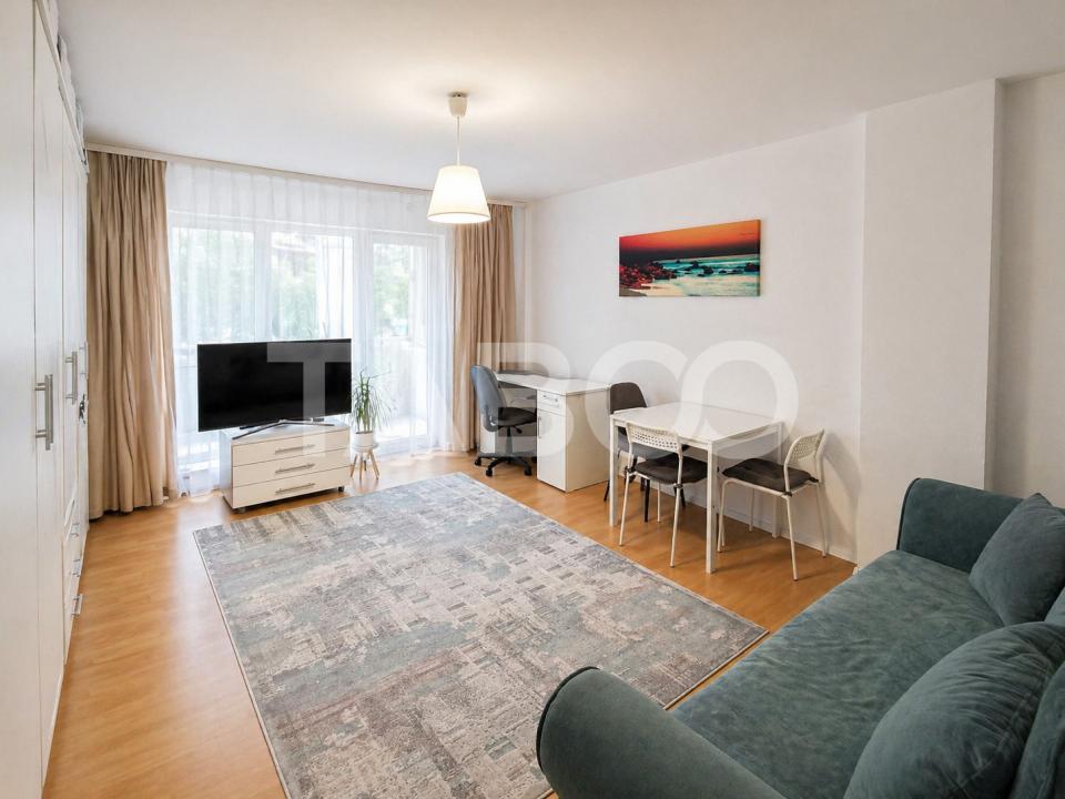 Garsoniera de vanzare 47 mp utili cu o mica gradina de 17 mp