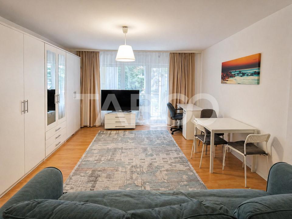 Garsoniera de vanzare 47 mp utili cu o mica gradina de 17 mp