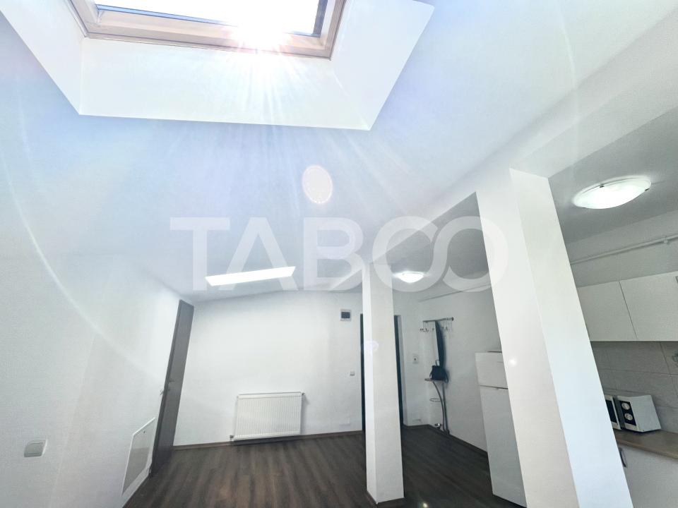 Garsoniera de vanzare in Marasti bloc nou la mansarda parcare inclusa