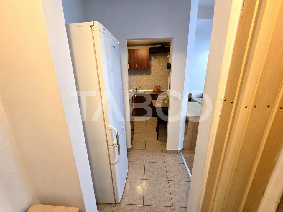 Garsoniera de vanzare mobilata utilata la parter in Vasile Aaron Sibiu