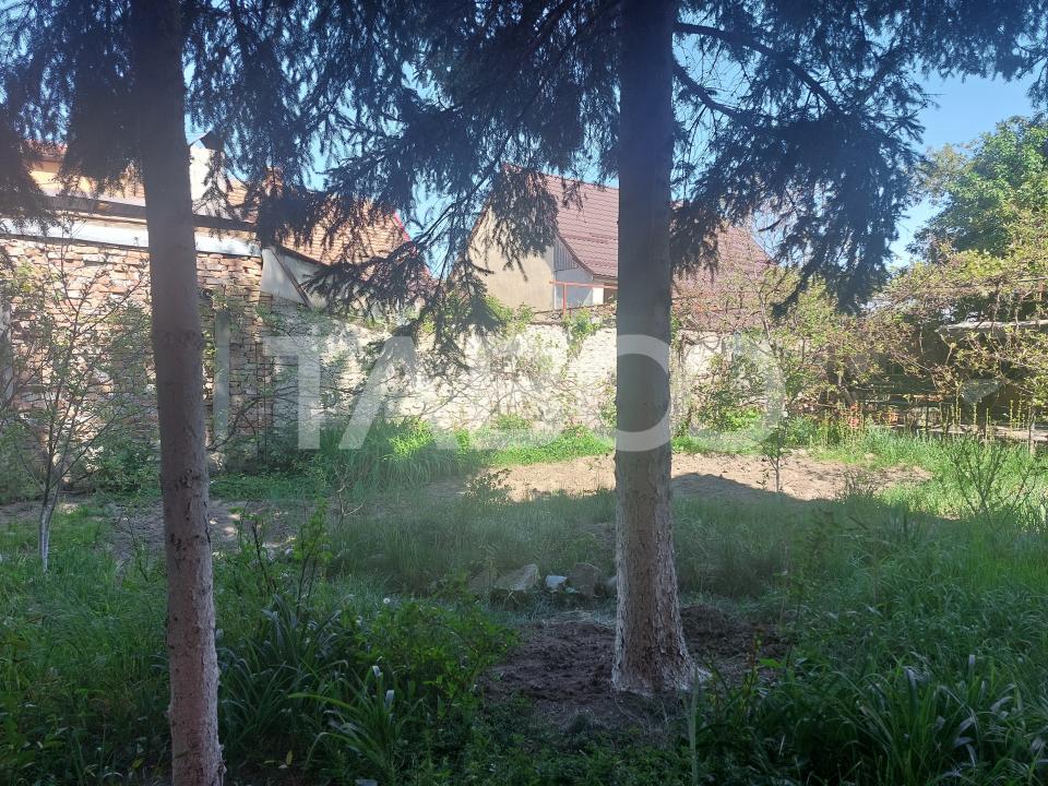 Garsoniera la casa 70 mp gradina proprie 371 mp Terezian Sibiu