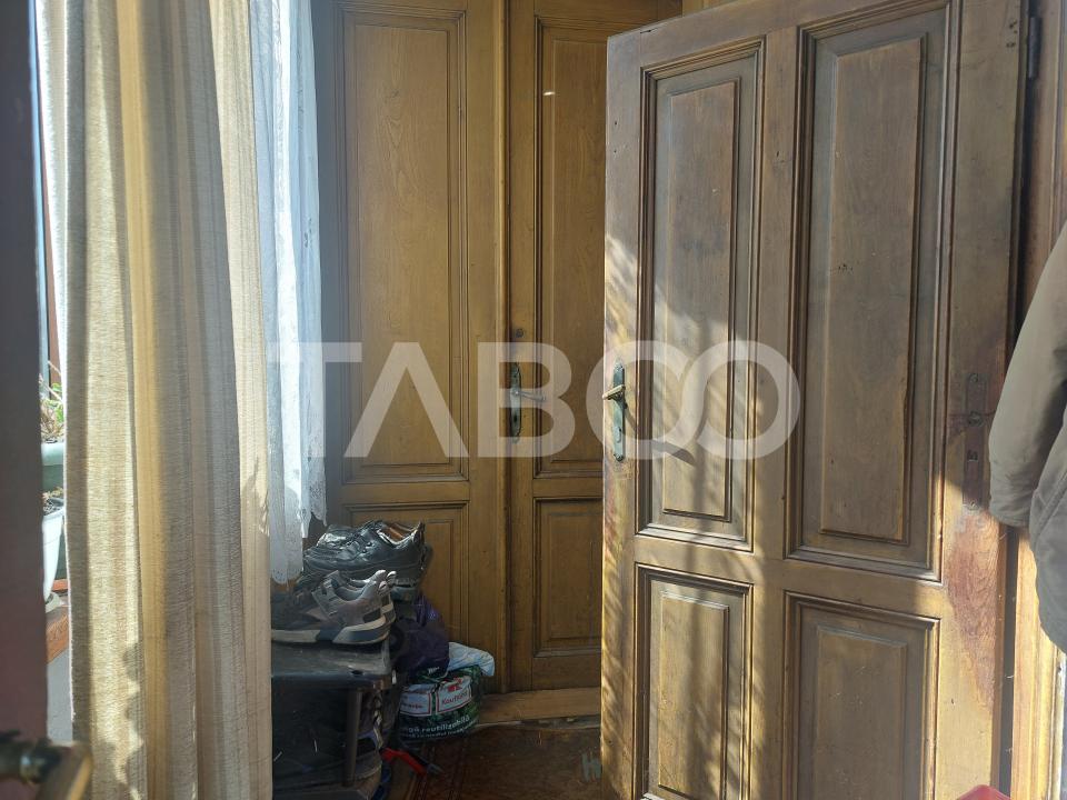 Garsoniera la casa 70 mp gradina proprie 371 mp Terezian Sibiu