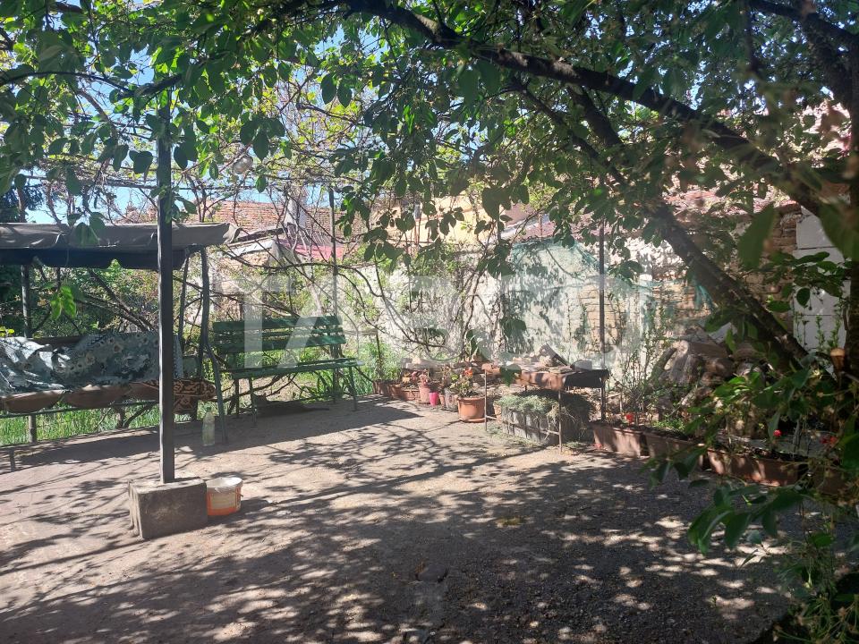 Garsoniera la casa 70 mp gradina proprie 371 mp Terezian Sibiu