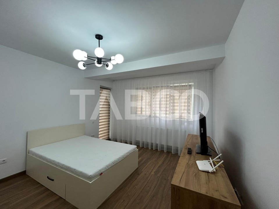 Garsoniera la prima inchiriere cu balcon si gradina in Selimbar 