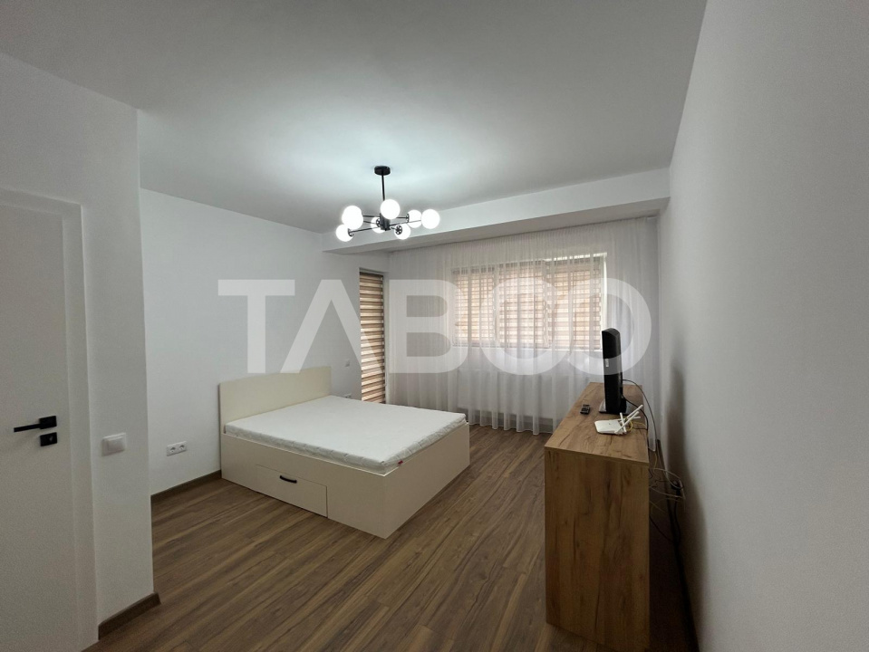 Garsoniera la prima inchiriere cu balcon si gradina in Selimbar 